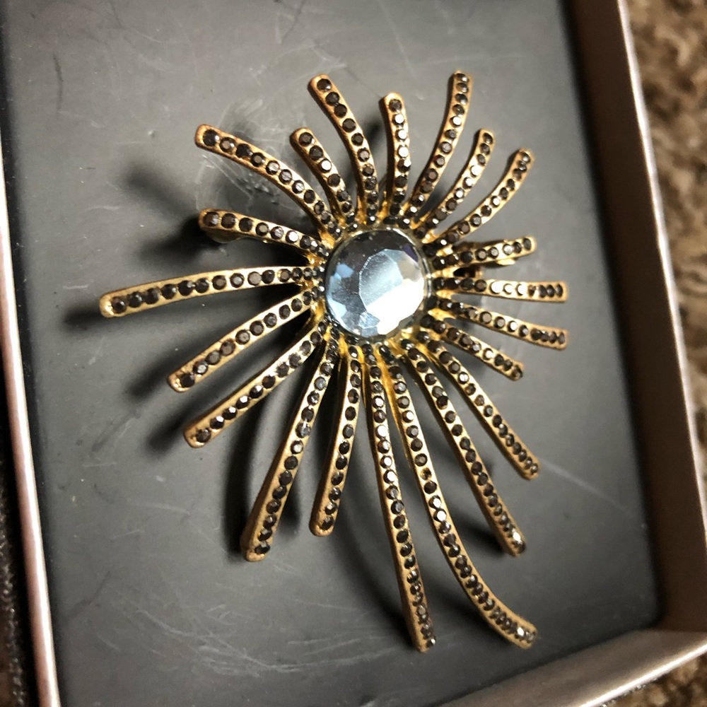 Gold Studded Brooch with Light Blue Gem